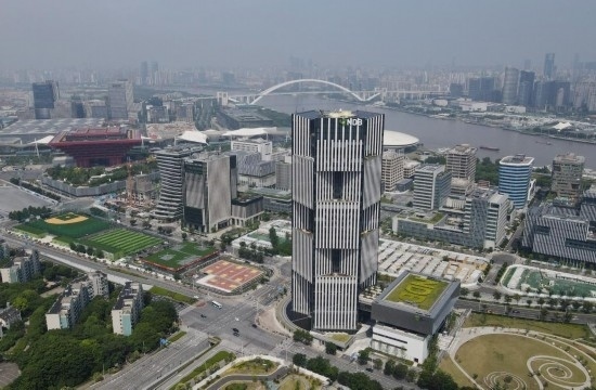 位于中國(guó)上海浦東新區(qū)世博園區(qū)的金磚國(guó)家新開發(fā)銀行總部大樓（2022年6月17日攝，無人機(jī)照片）。新華社記者方喆攝