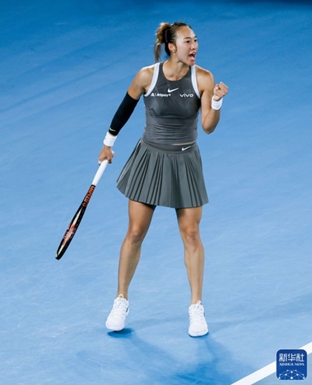 鄭欽文在比賽中慶祝得分。新華社記者 馬平 攝